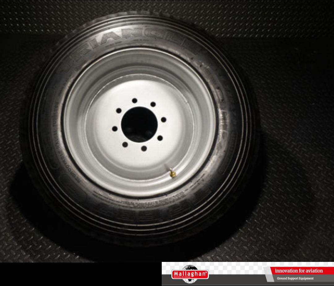 TIRE, (INCLUDING RIM)